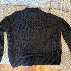 Black turtleneck sweater